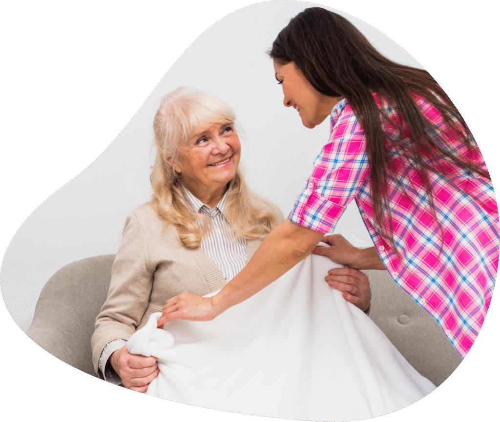Compassionate caregiver assisting senior at home with personalized Home Care in Denver CO.